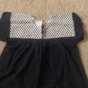 Black and white blouse.